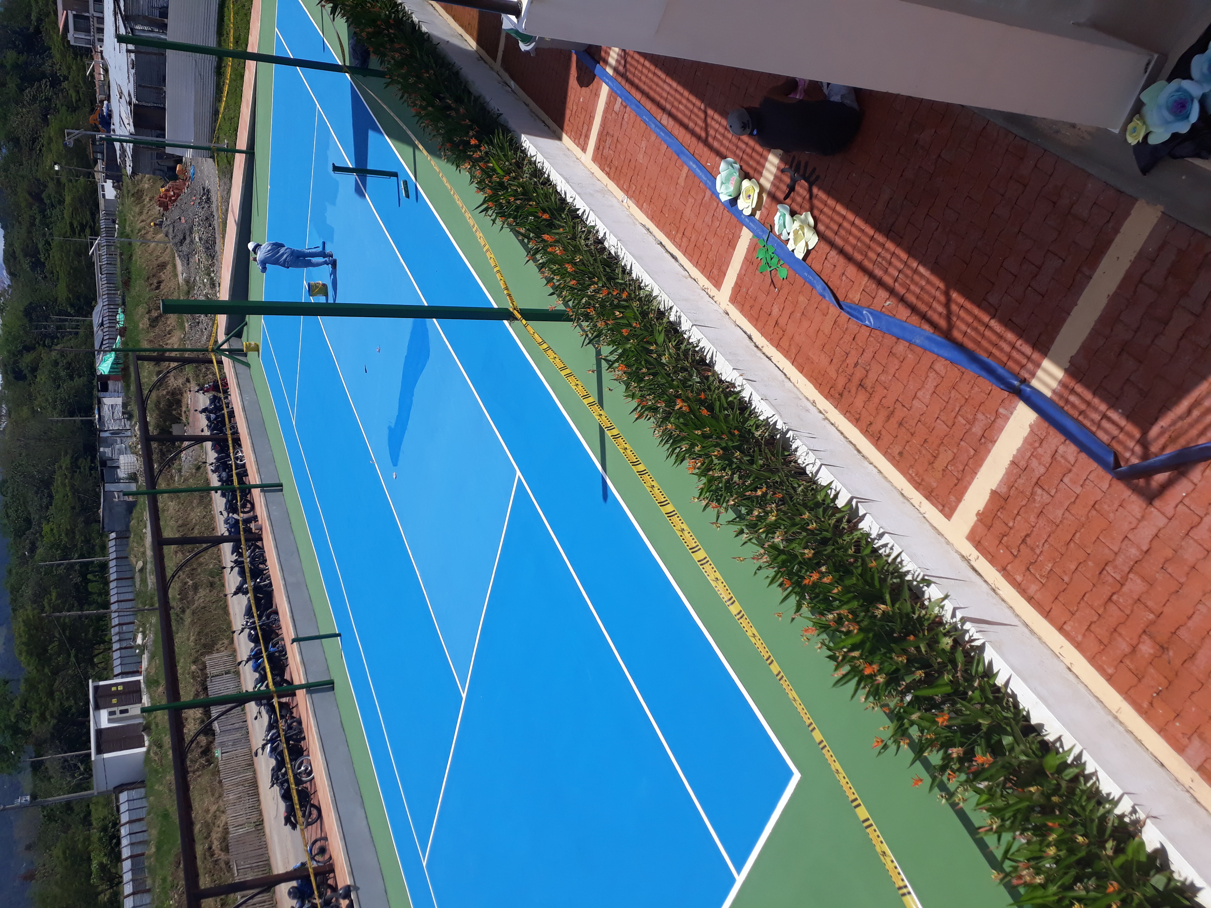 Pintura cancha de tenis